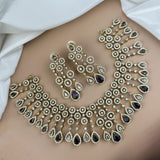 Ornate necklace and earrings on a model with a white background