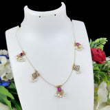 Jewelry set on a mannequin bust with flowers in the background