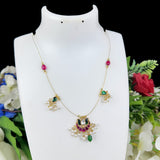 Decorative necklace on a white mannequin bust with floral background