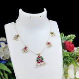 Jewelry set on a white mannequin bust with flowers in the background