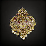 Embellished with shimmering faux diamonds, rich ruby-red stones, and delicate, dangling pearl droplets, this single jadai billa perfectly crowns the braid. It is the ultimate statement accessory for brides, festive occasions, and classical dancers looking for a blend of heritage artistry and contemporary elegance.
